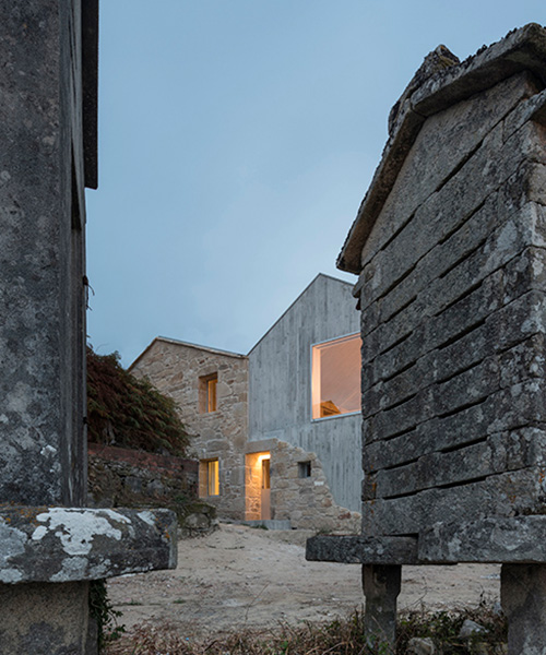 fuertespenedo arquitectos añade volumen de concreto a casa tradicional de piedra en españa