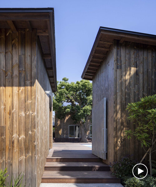 key operation inc. compone residencia privada japonesa como un conjunto de cabañas de madera
