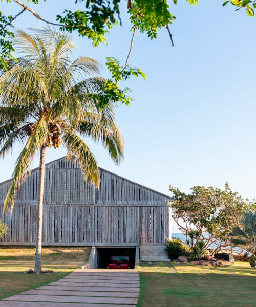 madera de palma plegable protege una residencia frente al mar de infraestudio en la habana