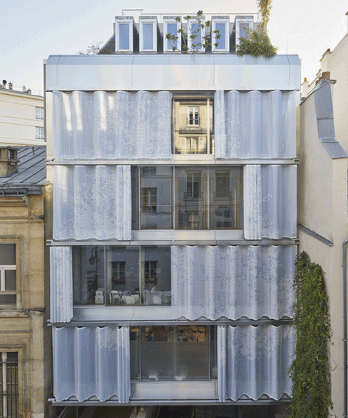 inside outside envuelve un nuevo edificio parisino con una fachada textil perforada
