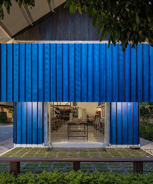 sher maker remata una casa comunal de madera plisada con techo de acero para un estudio de moda en chiang mai
