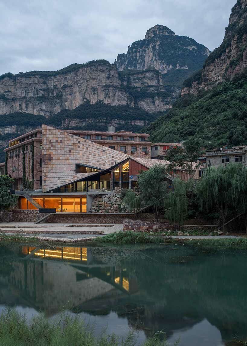 taihang xinyu art museum organically grows out of its rough terrain in rural china