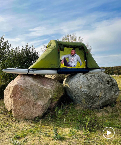 una tabla de surf de remo con tienda de campaña invita a los viajeros a dormir sobre rocas, lagos o el techo de un auto