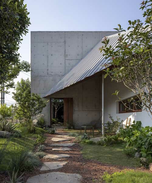 AHL architects juega con geometrías cruzadas en una casa multifuncional de vietnam