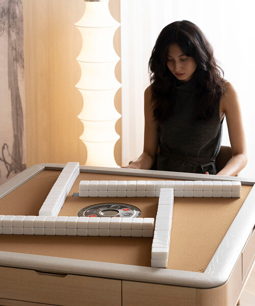 la elegante mesa de mahjong creada por li tian fusiona la cultura tradicional china con la tecnología moderna