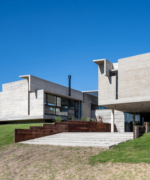 dos prismas rectangulares de concreto dan forma a una residencia en la costa de buenos aires